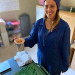 Ella sanctuary volunteer heating baby milk in LWT vet clinic